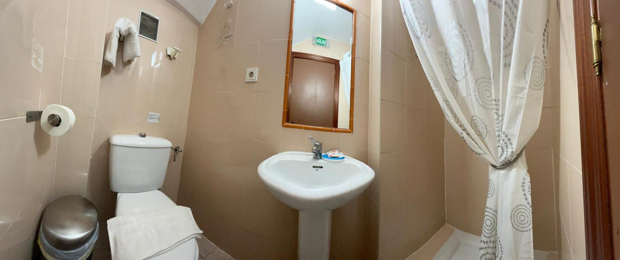 Single Room Shared Shower Toilet