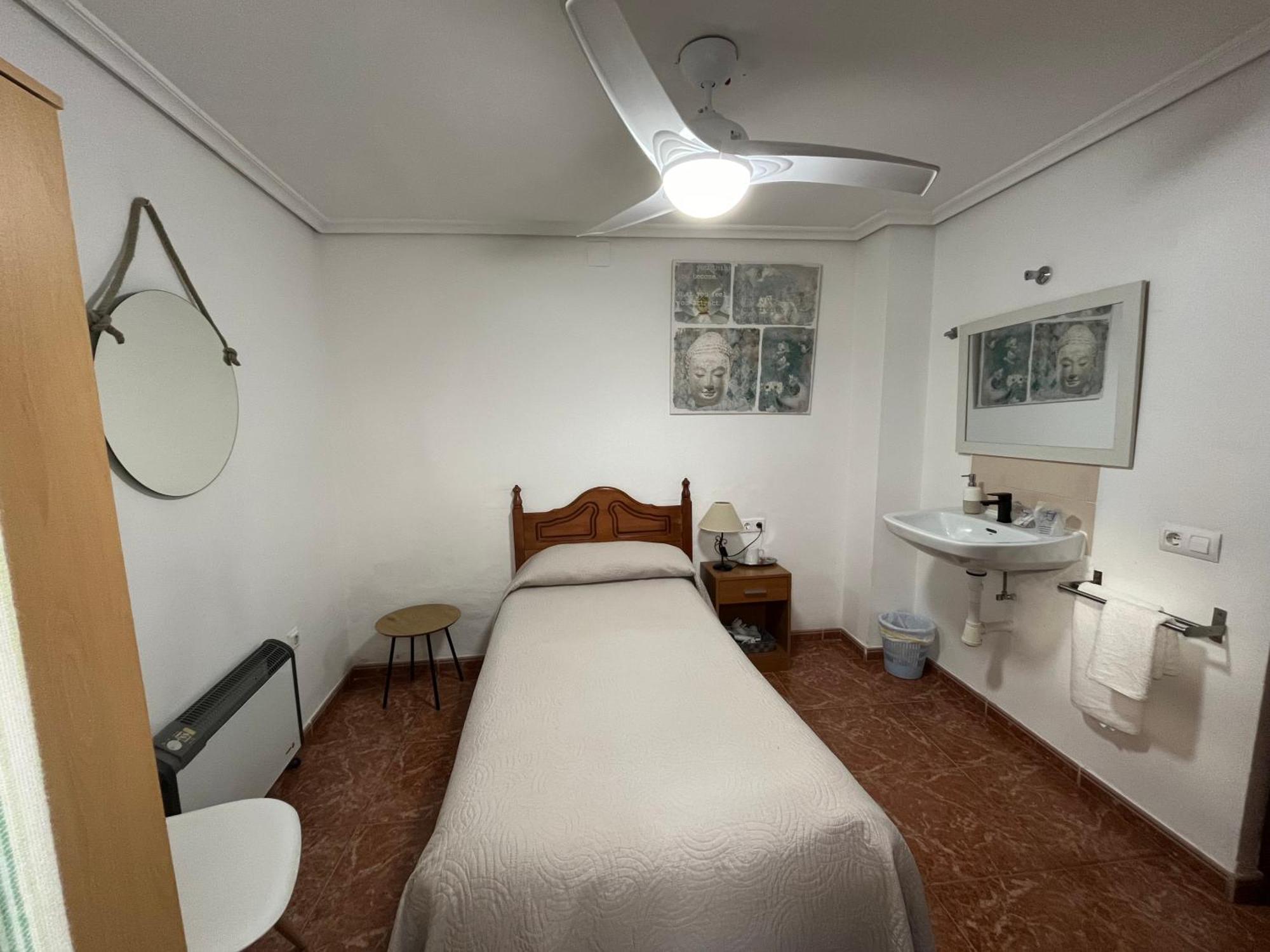 Single Room Shared Shower Toilet